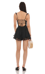 Dotted Sweetheart Neck Romper in Black